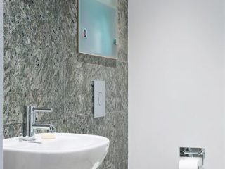 Badrumsinspiration - Kolmårdsmarmor på liten toalett