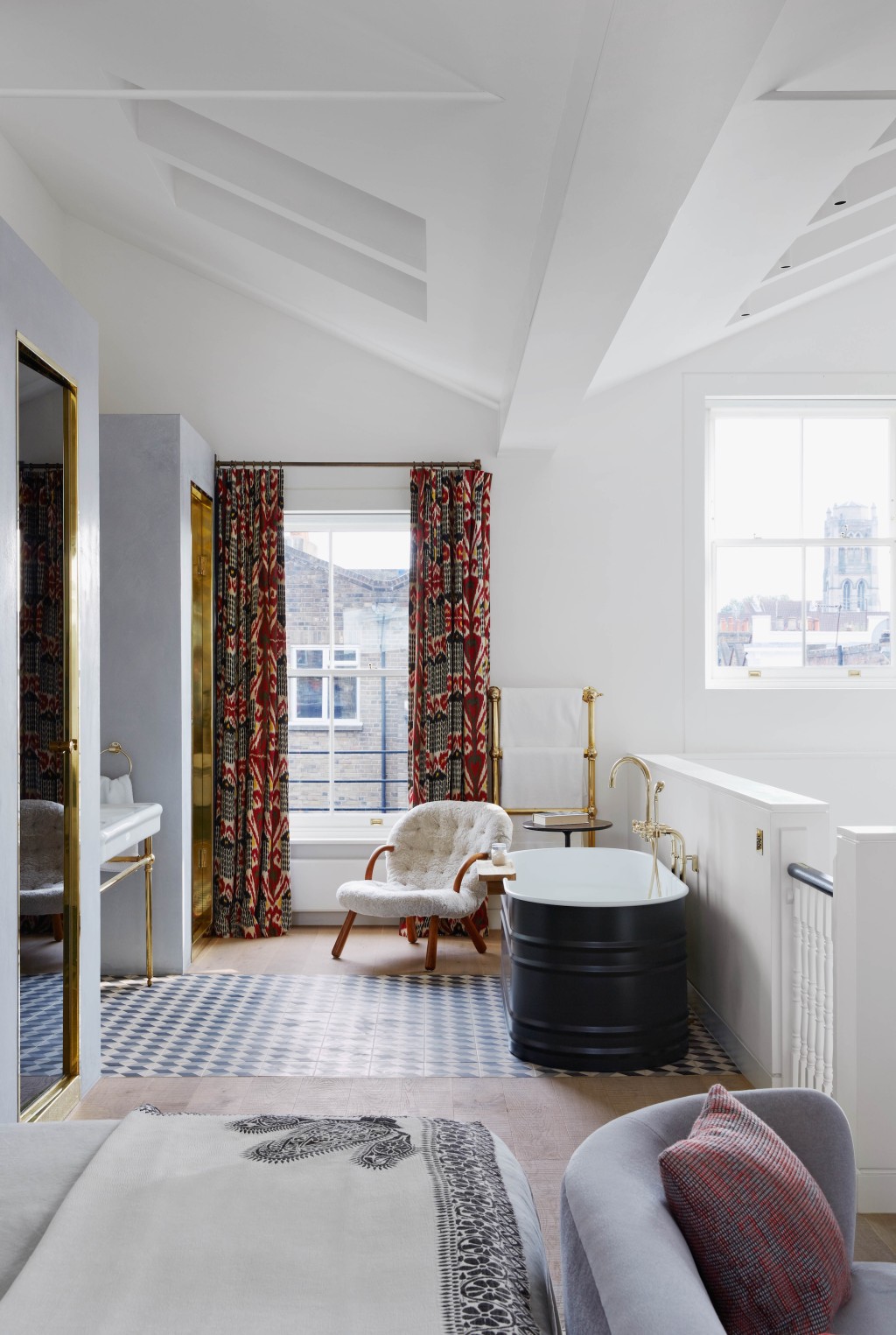 Feature, Notting Hill town house, contemporary, modern, graphic, geometric patterns, family home, bright, interior, open-plan main bedroom, bathroom, free-standing bath, chair, tiles