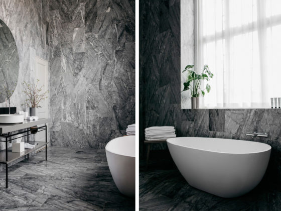 Badrumsinspiration - Grå marmor och rund spegel i badrum på Nobis Hotel Copenhagen ritat av Gert Wingårdh