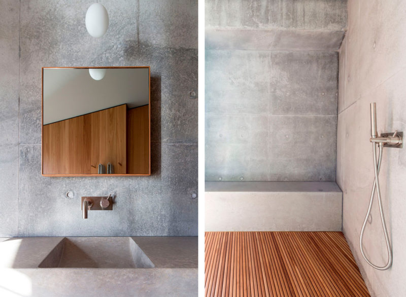 Badrumsinspiration - Betong i badrum med gjutet tvättställ, borstad stål blandare och platsbyggd förvaring i trä.