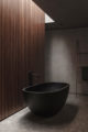 badrumsinspiration hotellbadrum tadelakt svart badkar badkarsblandare spalje casa cook chania foto georg roske badrumsdrommar