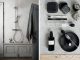 Badrumsinspiration - Stilleben i grått badrum med slitet trä, höga socklar, putsade väggar med styling av Lotta Agaton