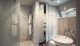 Badrumsinspiration - elegant klassiskt badrum i vindsvåning i Gamla Stan med carrara marmor, platsbyggd förvaring och grå snickerier